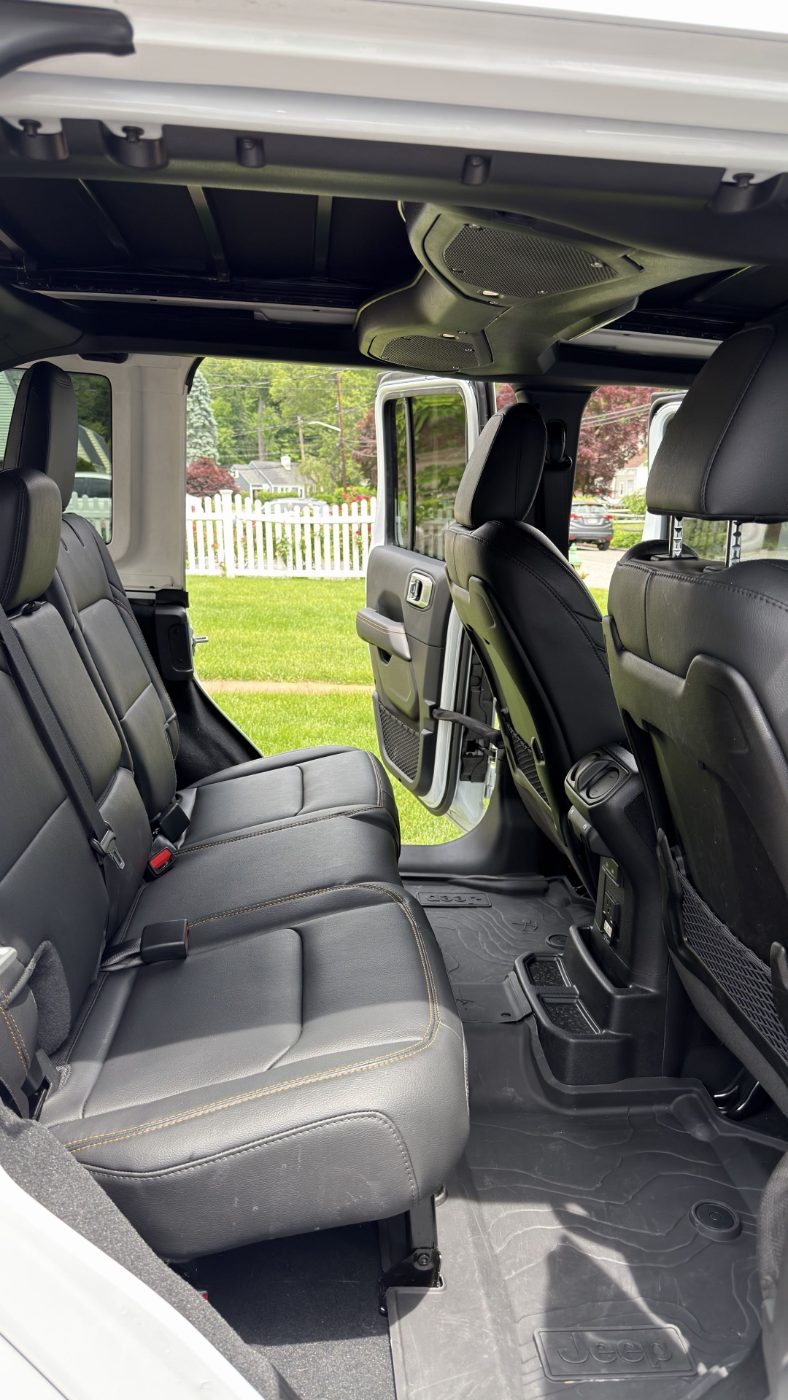 Jeep Wrangler rear cabin after detailing — spotless leather and mats