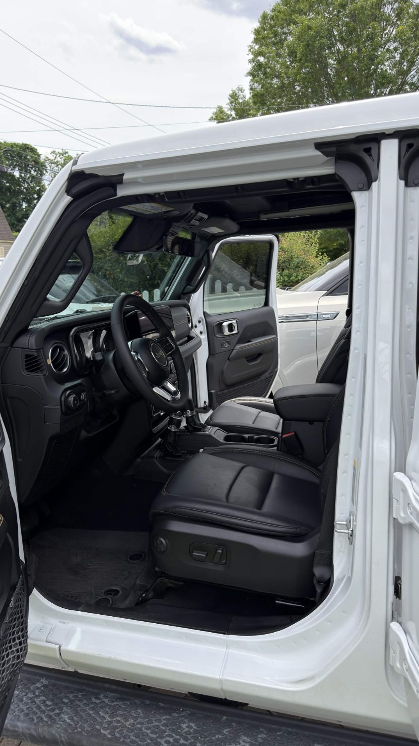 Detailed Jeep Wrangler front cabin, conditioned black leather