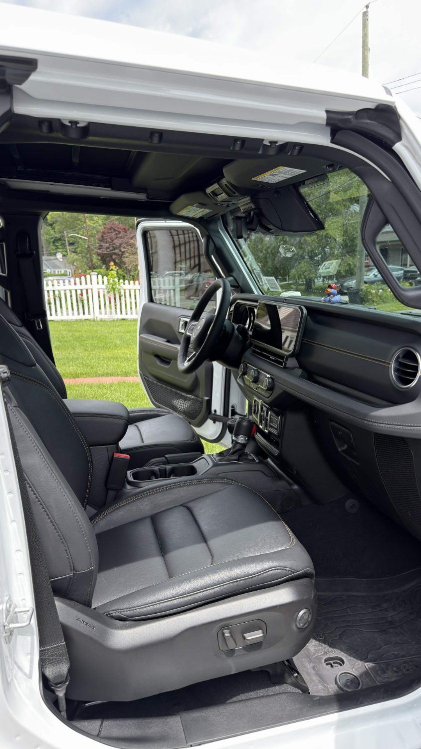 Detailed Jeep Wrangler cockpit and dashboard, steam cleaned